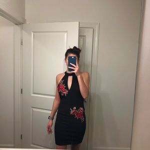 Black with red roses. Sleeveless midi dress